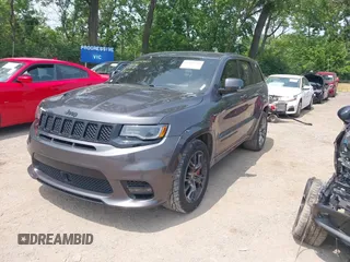 2018 Jeep Grand Cherokee SRT z VIN 1C4RJFDJ7JC281644, wystawiony jako IAAI lot #42481239 z przebiegiem 160 218 mil mil oraz . Historia ofert i sprzedaży dostępna na DreamBid. Obrazek 2.
