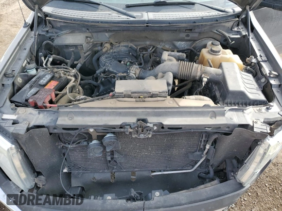 2011 Ford F-150 XL with VIN 1FTMF1CMXBFB70676, listed as a Copart auction lot 46237015 with 134,717 mi miles and Salvage Title. Bid and sale history available at DreamBid. Image 13.