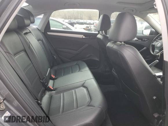 2013 Volkswagen Passat SE z VIN 1VWBH7A38DC021974, wystawiony jako Copart lot #50365355 z przebiegiem 127 888 mil mil oraz Szkoda całkowita • Salvage title. Historia ofert i sprzedaży dostępna na DreamBid. Obrazek 10.