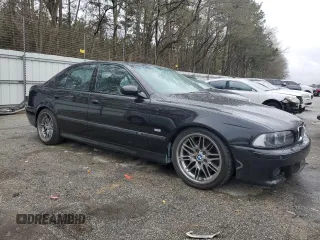 2000 BMW M5 z VIN WBSDE9345YBZ94319, wystawiony jako Copart lot #49945325 z przebiegiem 146 571 mil mil oraz Czysty tytuł • Clean title. Historia ofert i sprzedaży dostępna na DreamBid. Obrazek 4.