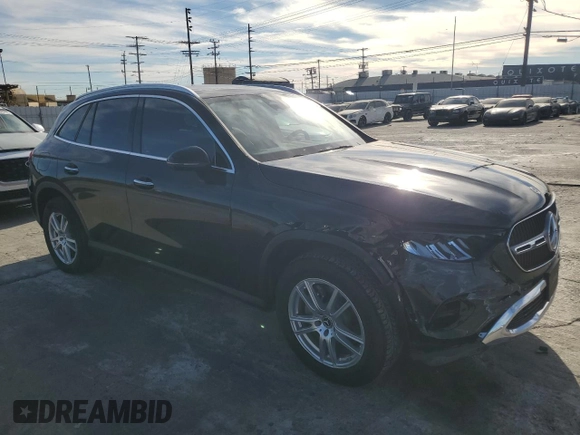 2023 Mercedes-Benz GLC with VIN W1NKM4GB4PU017214, listed as a Copart auction lot 87627235 with 8,678 mi miles and Salvage Title. Bid and sale history available at carsss.com. Image 4.