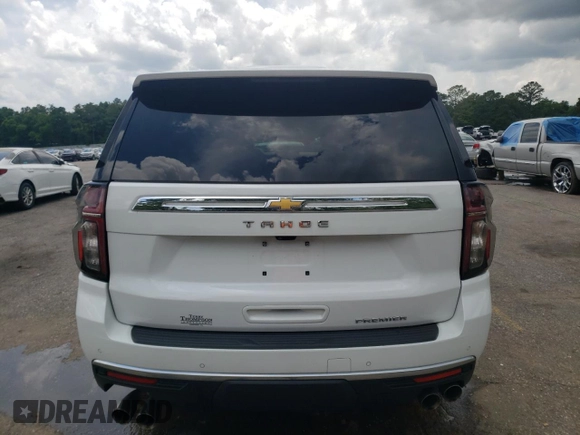 2024 Chevrolet Tahoe Premier with VIN 1GNSCSKD8RR247861, listed as a Copart auction lot 58767795 with 27,303 mi miles and Salvage title. Bid and sale history available at DreamBid. Image 6.