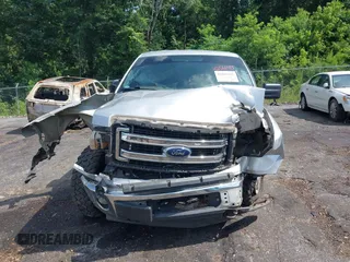 2014 Ford F-150 XL with VIN 1FTFW1EF9EKD53666, listed as a IAAI auction lot 42561185 with 239,511 mi miles and . Bid and sale history available at DreamBid. Image 12.