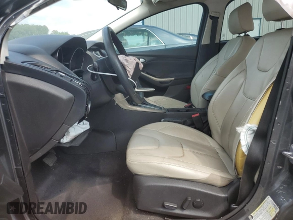 2018 Ford Focus Titanium z VIN 1FADP3N20JL271719, wystawiony jako Copart lot #60784755 z przebiegiem 116 118 mil mil oraz Szkoda całkowita • Salvage title. Historia ofert i sprzedaży dostępna na DreamBid. Obrazek 7.