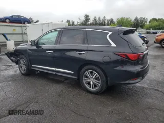 2020 Infiniti QX60 Pure with VIN 5N1DL0MM8LC517826, listed as a Copart auction lot 56527385 with 83,767 mi miles and Salvage title. Bid and sale history available at DreamBid. Image 2.