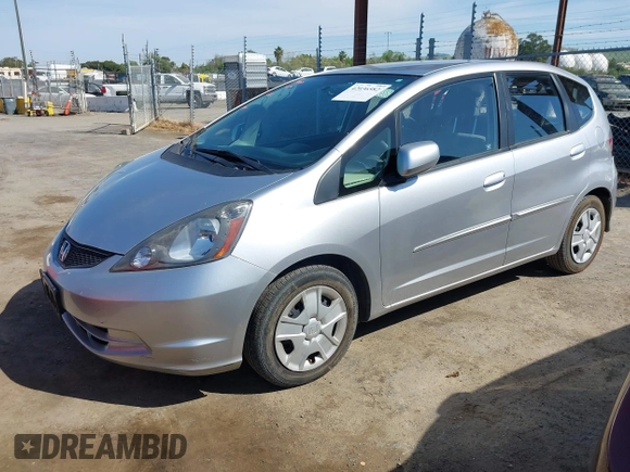 2013 Honda Fit with VIN JHMGE8H31DC042192, listed as a IAAI auction lot 42036582 with 63,223 mi miles. Bid and sale history available at carsss.com. Image 2.