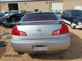 2003 Infiniti G35 z VIN JNKCV51E53M334588, wystawiony jako IAAI lot #41795156 z przebiegiem 99 906 mil mil oraz . Historia ofert i sprzedaży dostępna na DreamBid. Obrazek 16.