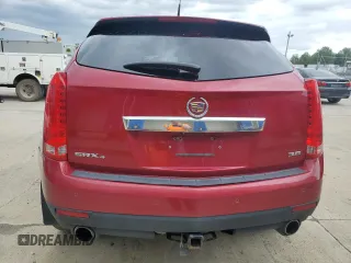 2014 Cadillac SRX Performance Collection z VIN 3GYFNFE38ES560229, wystawiony jako Copart lot #58025485 z przebiegiem 170 344 mil mil oraz Tytuł czysty. Historia ofert i sprzedaży dostępna na DreamBid. Obrazek 6.