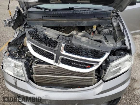 2017 Dodge Journey SE z VIN 3C4PDCAB2HT601316, wystawiony jako Copart lot #54153395 z przebiegiem 138 737 mil mil oraz Szkoda całkowita • Salvage title. Historia ofert i sprzedaży dostępna na DreamBid. Obrazek 12.