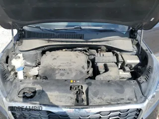 2019 Kia Sorento LX z VIN 5XYPG4A57KG486900, wystawiony jako Copart lot #52674115 z przebiegiem 105 259 mil mil oraz Szkoda całkowita • Salvage title. Historia ofert i sprzedaży dostępna na DreamBid. Obrazek 13.
