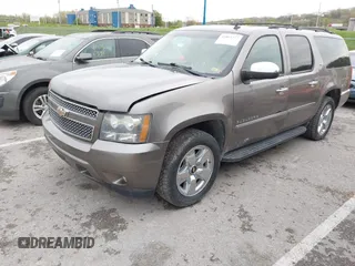 2011 Chevrolet Suburban LTZ with VIN 1GNSKKE32BR197356, listed as a IAAI auction lot 42052377 with 248,574 mi miles and . Bid and sale history available at DreamBid. Image 18.