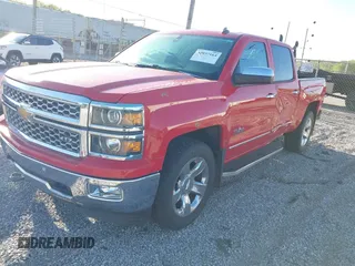 2014 Chevrolet Silverado 1500 LTZ with VIN 3GCUKSEC2EG300040, listed as a IAAI auction lot 42037164 with 64,271 mi miles. Bid and sale history available at carsss.com. Image 2.