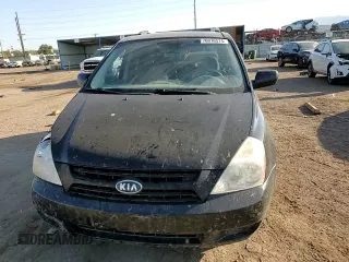 2010 Kia Sedona LX with VIN KNDMG4C31A6335678, listed as a Copart auction lot 76016514 with 130,889 mi miles and Salvage Title. Bid and sale history available at carsss.com. Image 12.