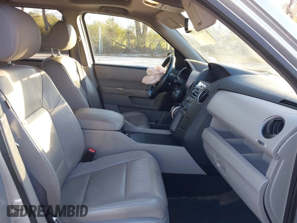 2015 Honda Pilot EX-L with VIN 5FNYF4H57FB006655, listed as a IAAI auction lot 41822385 with 125,915 mi miles and . Bid and sale history available at carsss.com. Image 5.