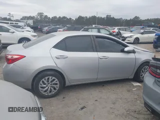 2019 Toyota Corolla L z VIN 2T1BURHE9KC188057, wystawiony jako IAAI lot #41298552 z przebiegiem 156 185 mil mil oraz . Historia ofert i sprzedaży dostępna na DreamBid. Obrazek 13.