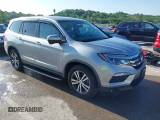 2016 Honda Pilot EX-L with VIN 5FNYF6H51GB005675, listed as a IAAI auction lot 42216621 with 117,086 mi miles and . Bid and sale history available at DreamBid. Image 1.