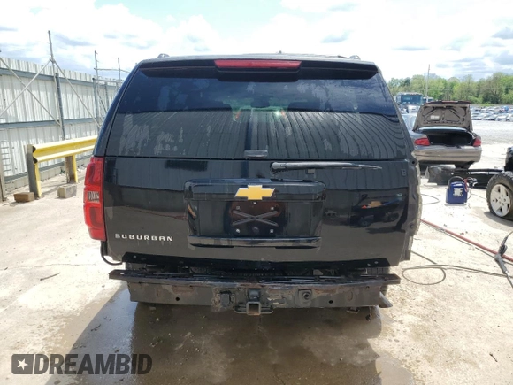 2014 Chevrolet Suburban LT with VIN 1GNSKJE77ER193143, listed as a Copart auction lot 54311935 with 171,407 mi miles and Salvage Title. Bid and sale history available at DreamBid. Image 6.