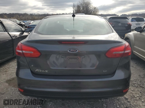 2017 Ford Focus SE with VIN 1FADP3F23HL346695, listed as a Copart auction lot 81313874 with 89,577 mi miles and Salvage title. Bid and sale history available at DreamBid. Image 6.