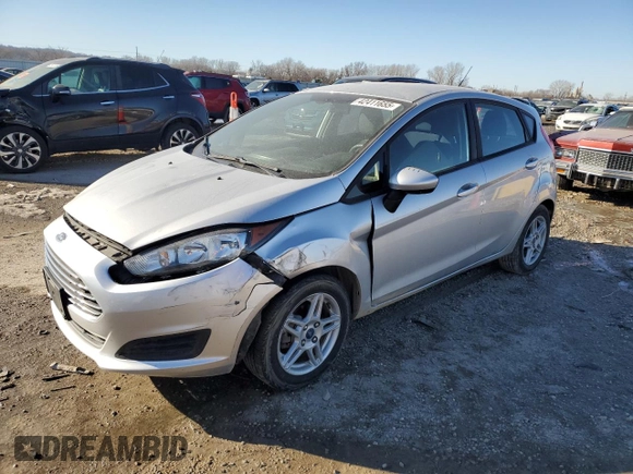 2019 Ford Fiesta SE z VIN 3FADP4EJ8KM109527, wystawiony jako Copart lot #42411655 z przebiegiem Nie podano mil oraz Szkoda całkowita • Salvage title. Historia ofert i sprzedaży dostępna na DreamBid. Obrazek 1.