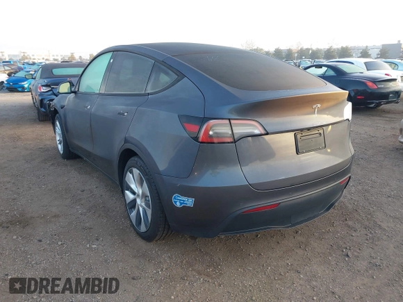 2021 Tesla Model Y Standard Range z VIN 5YJYGDED4MF121963, wystawiony jako IAAI lot #41490477 z przebiegiem 41 941 mil mil oraz . Historia ofert i sprzedaży dostępna na DreamBid. Obrazek 3.