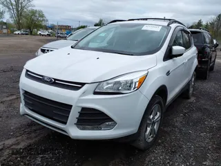 2016 Ford Escape SE with VIN 1FMCU9GX6GUB65266, listed as a IAAI auction lot 41559663 with 55,883 mi miles and . Bid and sale history available at DreamBid. Image 2.