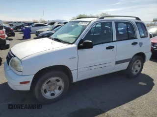 2003 Suzuki Vitara z VIN 2S3TE52V936103533, wystawiony jako Copart lot #55297135 z przebiegiem 122 230 mil mil oraz Szkody całkowita. Historia ofert i sprzedaży dostępna na DreamBid. Obrazek 1.