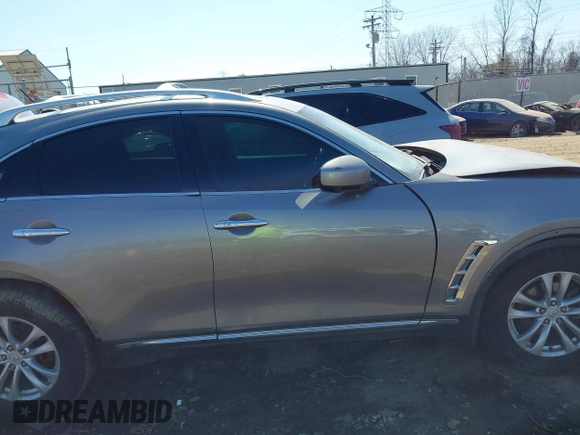 2011 Infiniti FX z VIN JN8AS1MW1BM733922, wystawiony jako IAAI lot #41779209 z przebiegiem 174 575 mil mil oraz . Historia ofert i sprzedaży dostępna na DreamBid. Obrazek 14.