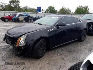 2011 Cadillac CTS Coupe Performance with VIN 1G6DL1ED5B0142375, listed as a Copart auction lot 72772384 with 64,717 mi miles and Salvage Title. Bid and sale history available at carsss.com. Image 1.
