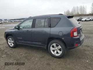 2014 Jeep Compass Latitude with VIN 1C4NJDEB4ED601769, listed as a Copart auction lot 48901365 with 129,826 mi miles and Salvage Title. Bid and sale history available at carsss.com. Image 2.
