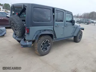 2015 Jeep Wrangler Unlimited Rubicon Hard Rock with VIN 1C4HJWFG1FL679873, listed as a IAAI auction lot 41508722 with 97,165 mi miles. Bid and sale history available at carsss.com. Image 4.
