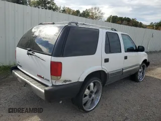 1995 GMC Jimmy SL with VIN 1GKCS13W4S2504849, listed as a Copart auction lot 84589834 with 285,930 mi miles and Salvage Title. Bid and sale history available at carsss.com. Image 3.