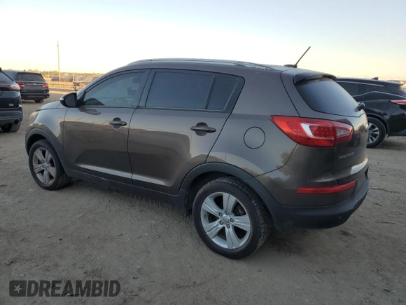2013 Kia Sportage LX z VIN KNDPB3A23D7465413, wystawiony jako Copart lot #79964134 z przebiegiem 122 467 mil mil oraz Szkoda całkowita • Salvage title. Historia ofert i sprzedaży dostępna na DreamBid. Obrazek 2.