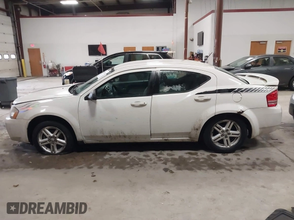 2008 Dodge Avenger SXT with VIN 1B3LC56K98N282097, listed as a IAAI auction lot 41380832 with 220,631 mi miles. Bid and sale history available at carsss.com. Image 14.