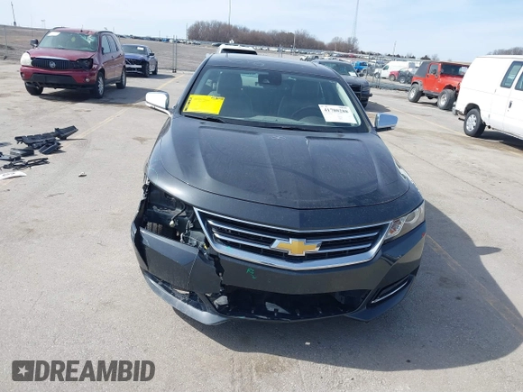 2015 Chevrolet Impala LTZ with VIN 1G1165S39FU138640, listed as a IAAI auction lot 41780288 with 145,000 mi miles and . Bid and sale history available at DreamBid. Image 6.