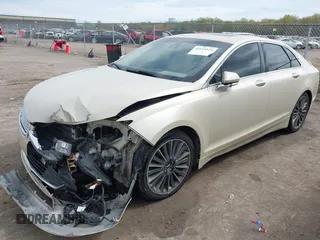 2014 Lincoln MKZ z VIN 3LN6L2JK7ER821385, wystawiony jako IAAI lot #42114154 z przebiegiem 141 480 mil mil oraz . Historia ofert i sprzedaży dostępna na DreamBid. Obrazek 18.