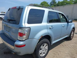 2009 Mercury Mariner z VIN 4M2CU81709KJ22168, wystawiony jako IAAI lot #42437718 z przebiegiem 110 890 mil mil oraz . Historia ofert i sprzedaży dostępna na DreamBid. Obrazek 4.