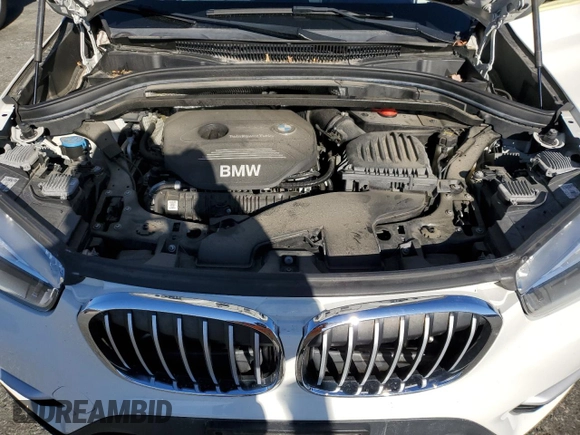 2016 BMW X1 xDrive28i with VIN WBXHT3C32G5E52052, listed as a Copart auction lot 79522024 with 76,995 mi miles and Salvage Title. Bid and sale history available at carsss.com. Image 12.