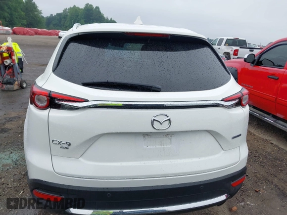 2021 Mazda CX-9 Signature with VIN JM3TCBEY4M0517118, listed as a IAAI auction lot 42400675 with 56,260 mi miles and . Bid and sale history available at DreamBid. Image 17.