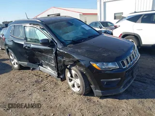2018 Jeep Compass Latitude with VIN 3C4NJDBB1JT484239, listed as a IAAI auction lot 41670446 with 122,245 mi miles and . Bid and sale history available at DreamBid. Image 1.