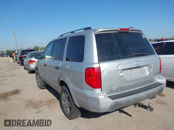 2005 Honda Pilot EX-L with VIN 5FNYF18585B061869, listed as a IAAI auction lot 41982694 with 183,873 mi miles. Bid and sale history available at carsss.com. Image 3.