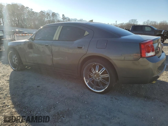 2009 Dodge Charger Police with VIN 2B3KA43T39H641981, listed as a Copart auction lot 88724085 with 145,779 mi miles and Salvage Title. Bid and sale history available at carsss.com. Image 2.