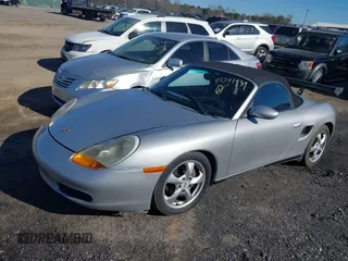2001 Porsche Boxster with VIN WP0CA29871U627576, listed as a IAAI auction lot 41341939 with 122,500 mi miles. Bid and sale history available at carsss.com. Image 2.