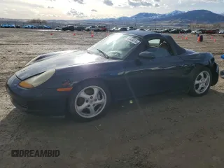 1998 Porsche Boxster z VIN WP0CA2987WU626225, wystawiony jako Copart lot #87449074 z przebiegiem 122 804 mil mil oraz Czysty tytuł • Clean title. Historia ofert i sprzedaży dostępna na DreamBid. Obrazek 1.