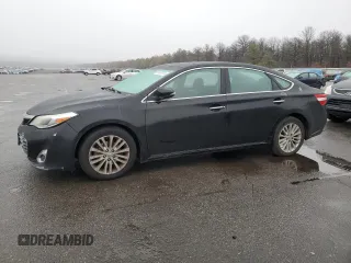 2015 Toyota Avalon Hybrid XLE Touring with VIN 4T1BD1EB9FU044119, listed as a Copart auction lot 84160704 with 424,515 mi miles and Clean Title. Bid and sale history available at carsss.com. Image 1.