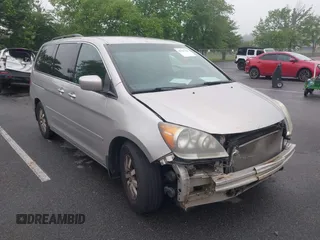 2009 Honda Odyssey EX with VIN 5FNRL38489B041448, listed as a IAAI auction lot 42527220 with 204,408 mi miles and . Bid and sale history available at DreamBid. Image 1.