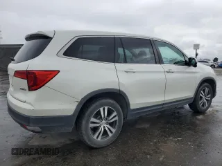 2017 Honda Pilot EX with VIN 5FNYF6H34HB042249, listed as a Copart auction lot 49176455 with 127,698 mi miles and Salvage Title. Bid and sale history available at DreamBid. Image 3.