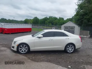 2014 Cadillac ATS Standard RWD with VIN 1G6AA5RA5E0173517, listed as a IAAI auction lot 42540181 with 73,732 mi miles and . Bid and sale history available at DreamBid. Image 14.