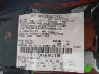 2007 Ford Focus S z VIN 1FAHP34N37W161610, wystawiony jako IAAI lot #42370742 z przebiegiem Nie podano mil oraz . Historia ofert i sprzedaży dostępna na DreamBid. Obrazek 9.