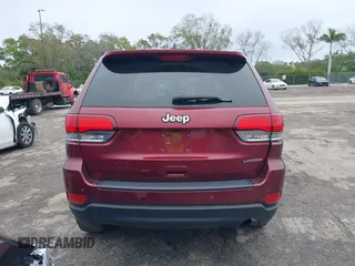 2022 Jeep Grand Cherokee Laredo X with VIN 1C4RJEAG0NC128094, listed as a IAAI auction lot 41402308 with 34,190 mi miles and . Bid and sale history available at DreamBid. Image 16.