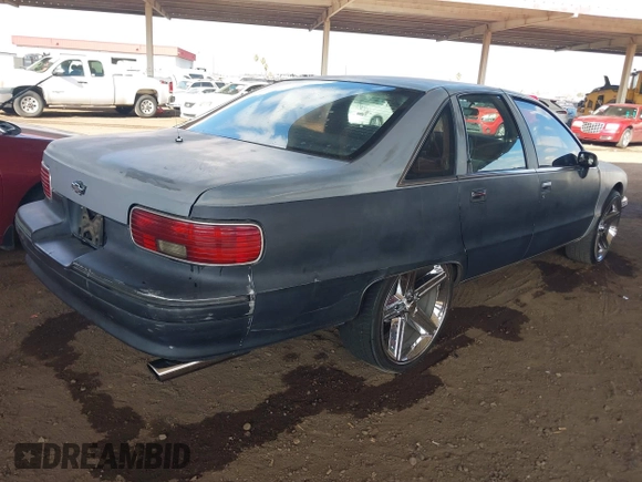 1992 Chevrolet Caprice with VIN 1G1BL53E1NR119546, listed as a IAAI auction lot 41461158 with 140,234 mi miles and . Bid and sale history available at DreamBid. Image 4.